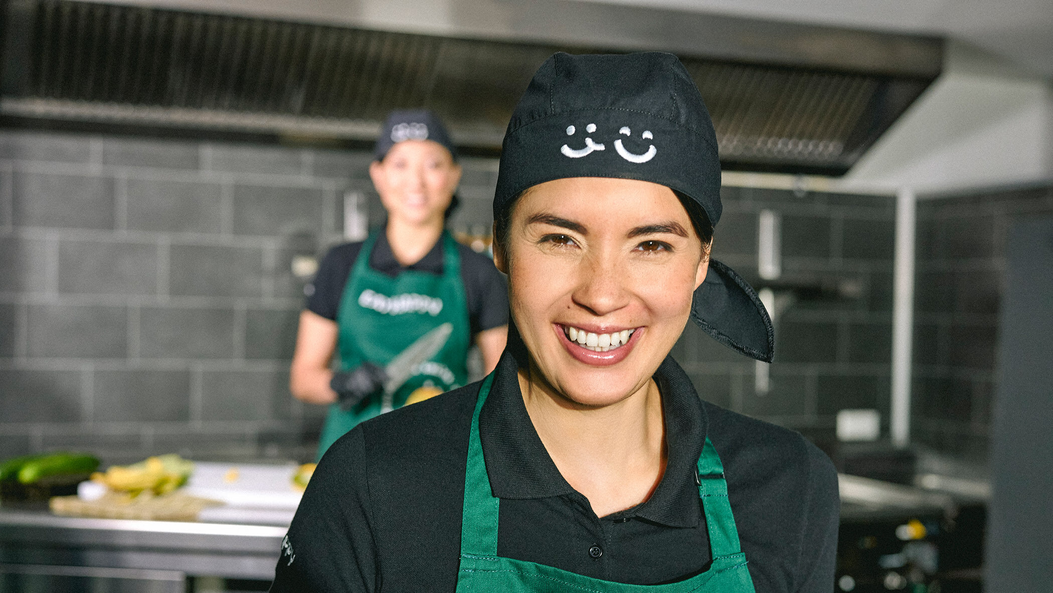 smiling EAT HAPPY employee
